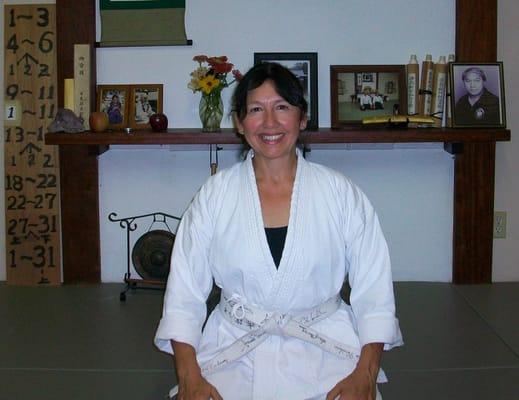 Debbie G. , Client of  Month, 9/09  Back kicking  serious martial arts butt after long term pain & stiffness from skiing injury.