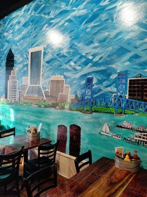 Cool piece of art depicting Jacksonville on the wall.