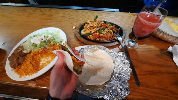 Chicken fajitas and a strawberry margarita.