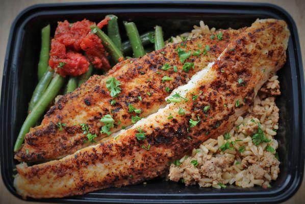 Cajun Swai: 5oz swai, smothered green beans, turkey dirty rice