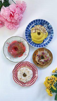 Ras malai rabdi bundt cake, rose pistachio bundt cake, gulab jamun bundt cake, and coconut cream ladoo donut.