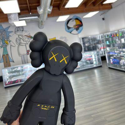 Welcome! Kaws Statue