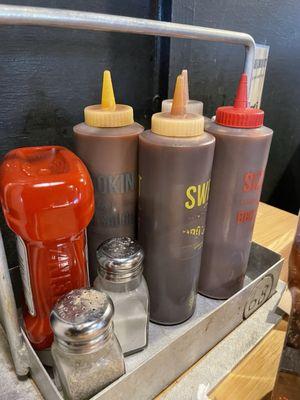 Sauces and condiments at each table