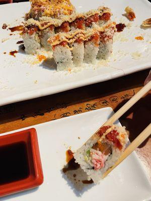 Sushi rolls (half eaten): Valentine, Hollywood Crunch and Fujiyama Rolls