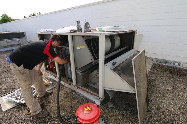 Cleaning roof top air handling unit