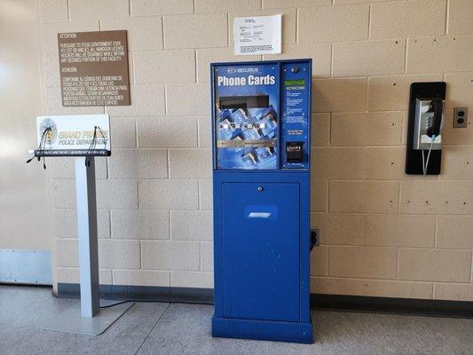 Chargers, phone cards, and payphone in the waiting area