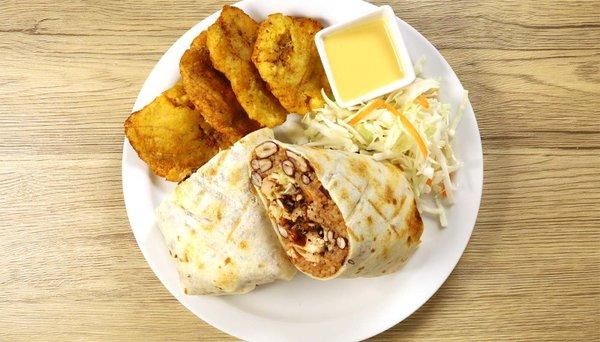 A diced jerk chicken burrito, with rice, kidney beans, and cabbage salad. Served with savory plantains an salad.