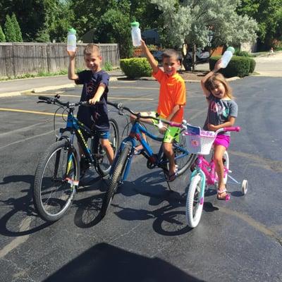 # happy kiddos on 3 kids Giant bicycles