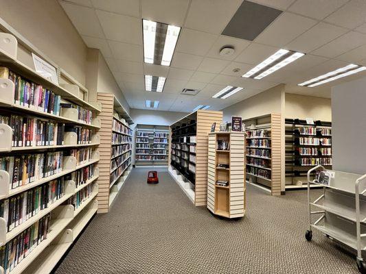 New fiction room hidden by main entrance. Located next to circulation desk. I didn't see it until I was checking out and leaving.