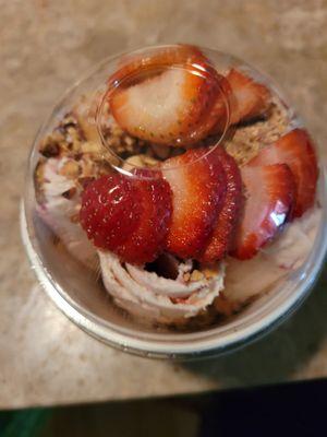 Custom, vanilla ice cream with almonds and strawberries.