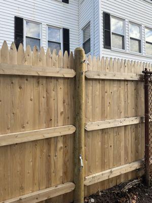 Installed fence without planting post to ground. And should ed Feeney not flip the fence so the other side is facing my property ?