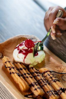 Churros with ice cream dessert.