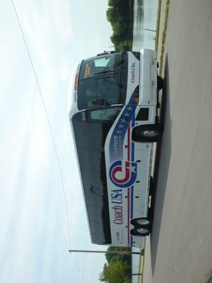 A Coach USA bus in action.