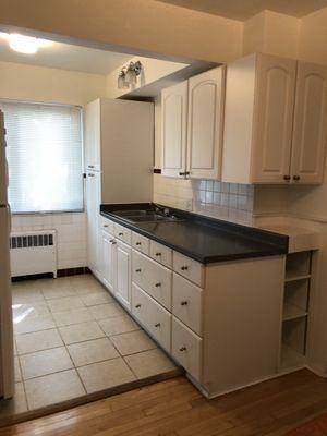 a $19 faucet from Home Depot compliments this fiberboard wood station without much function. Sink leaks also.