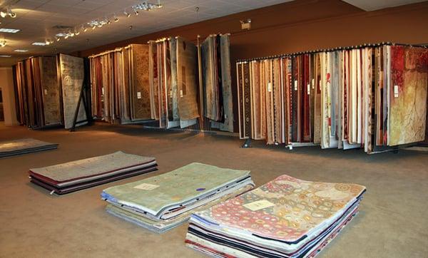 Selection of 5'x8' rugs.