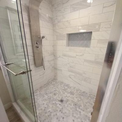 Shower remodel with 6 x 16 on shower walls and hexagon on shower floor