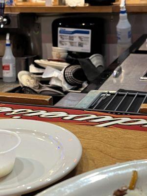 Overflowing dirty dishes. How clean are those paper towels now?