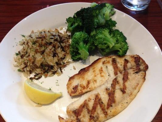 Fresh tilapia on wood fire grille. 2 sides.