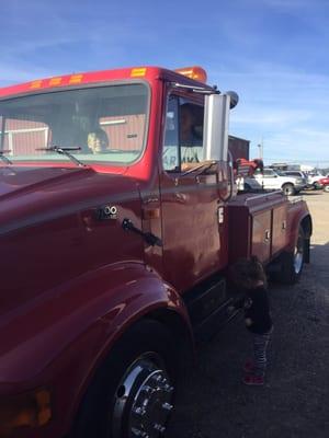 Inspecting the tow truck can be a fun family bonding chore for the Bolton family.