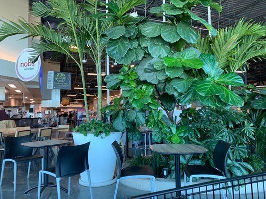 Seating area between Starbucks and wine bar