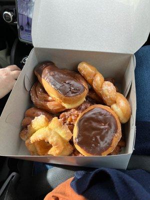 Eclair, glaze twist, old fashion, Apple fritter, and cinnamon roll. Yum Delish!!