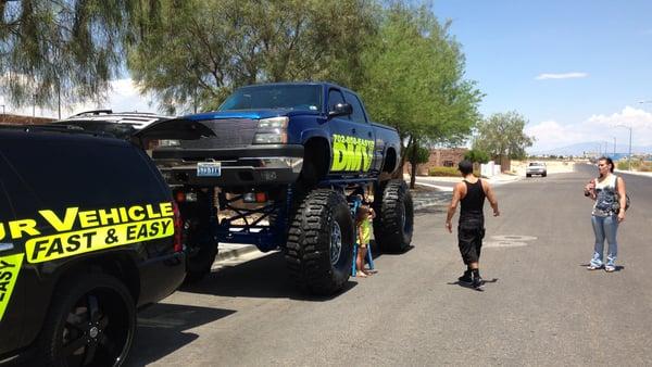 People always taking pics of kids under truck.