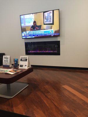 Waiting area with television.