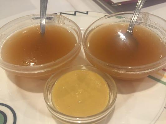 A sweet, fruity sauce and mustard that were served for the meal.  We didn't use the sweet sauce.