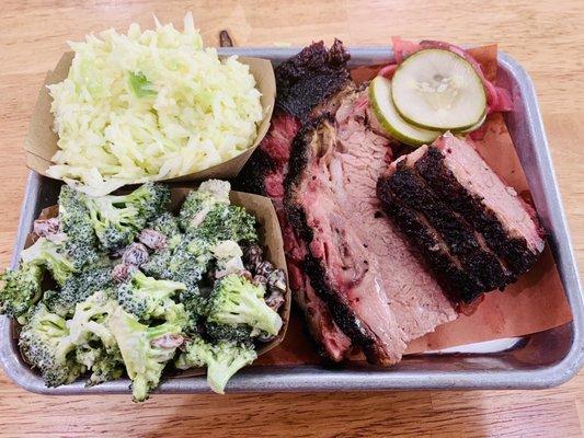 Slaw, broccoli salad, brisket, pickles