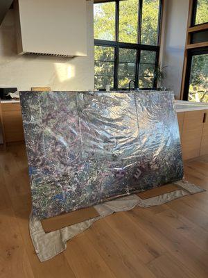 48"x79" - 50lbs - transported with a huge amount of care from Florida to California. Thank you Fine Art Shippers!