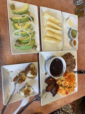 Yuca fries, avocado salad, papa relena, ropa vieja with the yellow rice. Better choice than white rice.