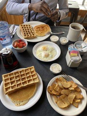 2 Waffle Breakfast with double eggs, side of 2 pancakes, side of potato hash, fruit cup side