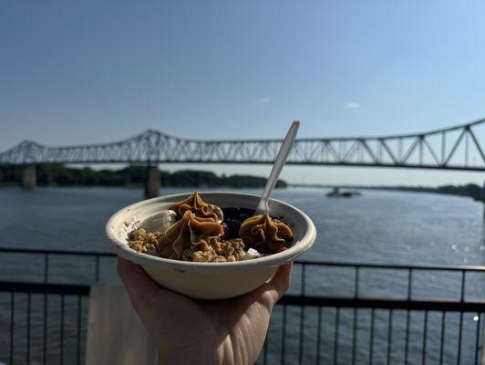 Small açaí bowl with peanut butter, granola, and fruit