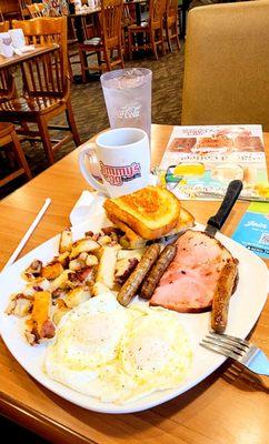 12/1/2023 Classic combo Two eggs over easy home fries fresh off The grill Meat choices ham sausage thick white toast cawfee