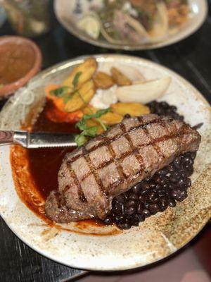 NY steak, black beans, & assorted vegetables.