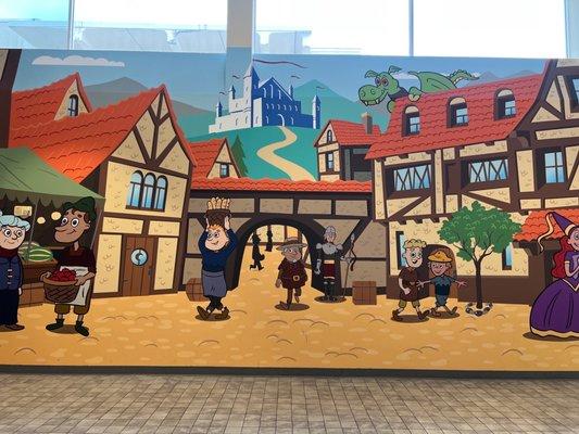 Mural at the Cinemark/Playground entrance.