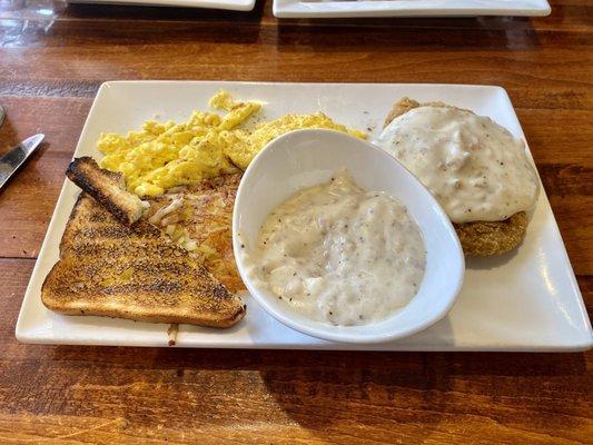 Country fried steak, scrambled eggs, hash browns and the best toast! I ordered an extra gravy for my hash browns.