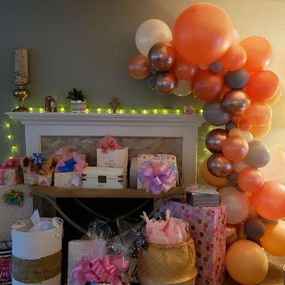 Organic Garland in rose gold, gray with dots of white complimented the many beautifully wrapped gifts at this baby shower!