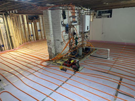 Radiant heat flooring installation in Lemont after we also installed a new Navian Tankless Water heater.