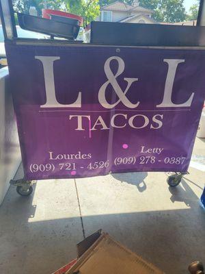 Of taco cooking station and sign