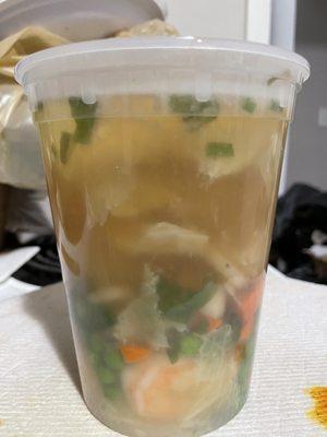 Seafood Soup (shrimp, squid, scallops, tofu, cabbage, carrots, peas, chives, in a mild broth)