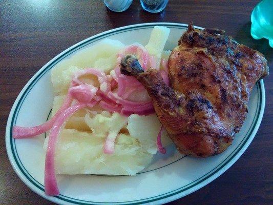 Chicken quarter and cooked cassava and onions