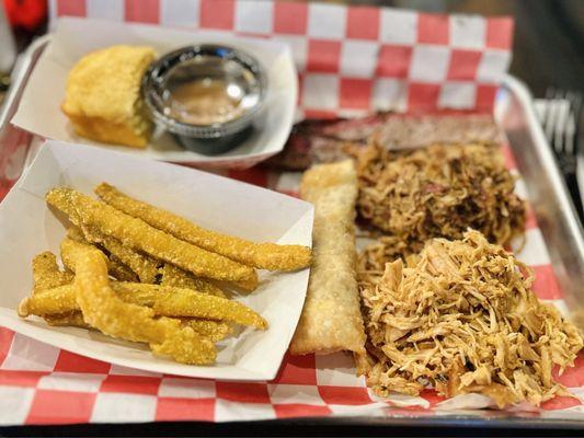 Pulled chicken, pulled pork, brisket, pulled pork egg roll, pickle fries, sweet corn bread