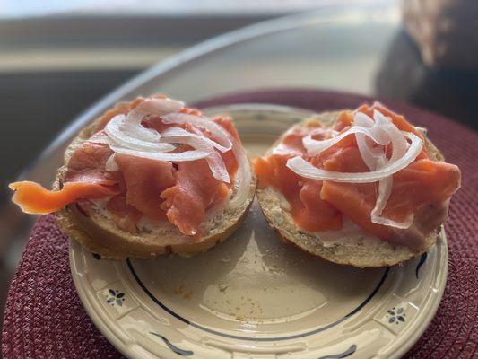 Smoked salmon, on bagel w cream cheese and Visalia onion.