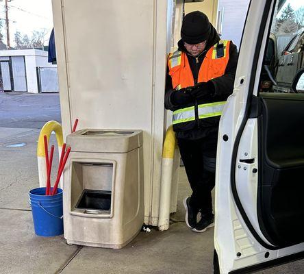 Attendant more interested in his cell instead of helping customers!