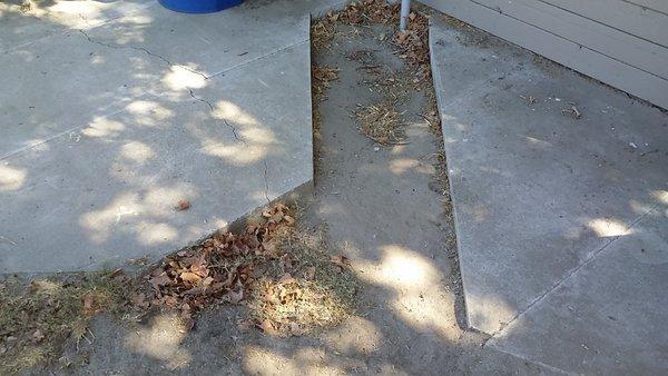 What my patio looks like after they left. I had to carry out the concrete myself. (I'm 70 yrs old)
 Now I have to pay to have it replaced.