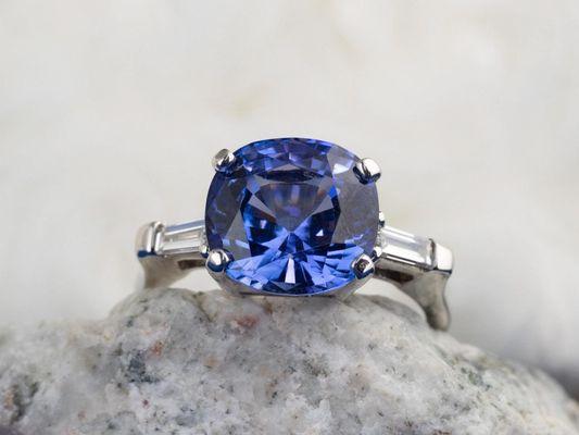 A stunning tanzanite ring with diamond baguette accents