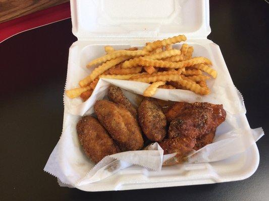 Half Garlic Pepper, Half Mild Garlic Pepper. All breaded, all flats with crispy fries.