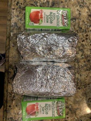 Chicken burrito, veggie burrito, and juice for size