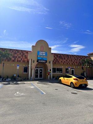 Restaurant front door and parking lot.